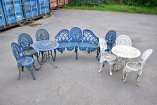 A blue painted aluminium garden table and four chairs, together with a blue painted iron three