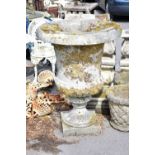 A Victorian stone garden urn on square stepped plinth, height 109cm. Condition Report: Urn looks