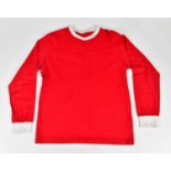 GEORGE BEST; a Manchester United 1960s retro style signed football shirt, signed to the reverse.