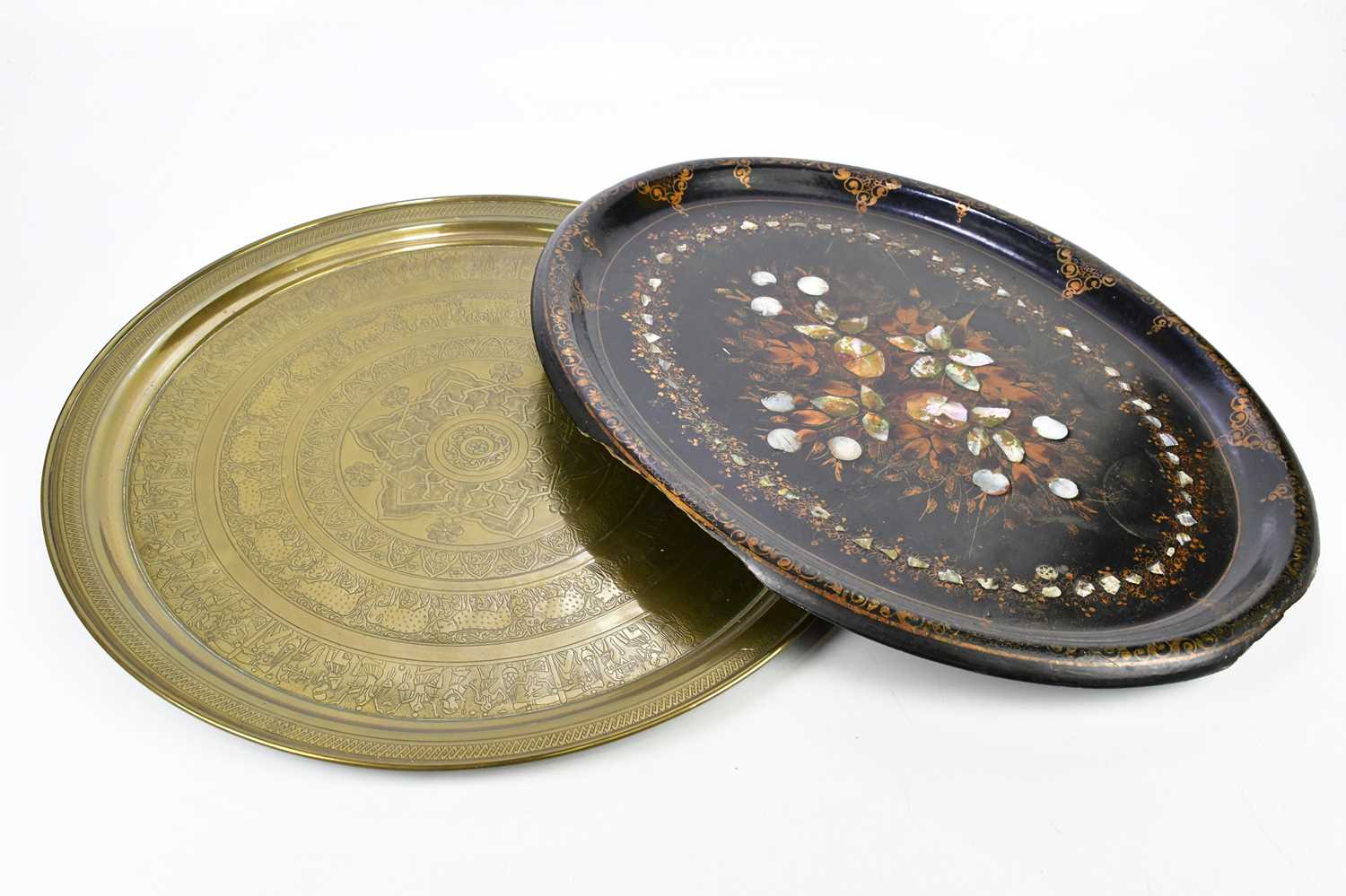 A Victorian papier-mâché and mother of pearl butler's tray of oval form with floral decoration,