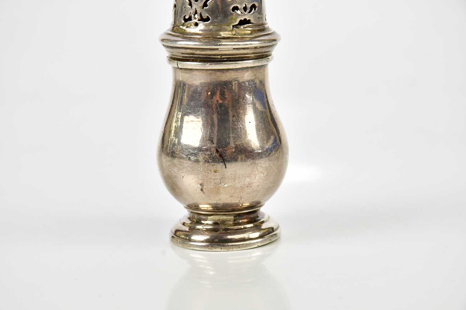 A George I hallmarked silver pepperette of baluster form, with cast acorn finial, the body - Image 3 of 5