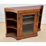 A late 19th century inlaid credenza with gilt metal applied mount flanking the single glazed door on