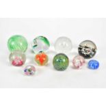 Ten glass paperweights, including a Clichy type paperweight, diameter 4.5cm.