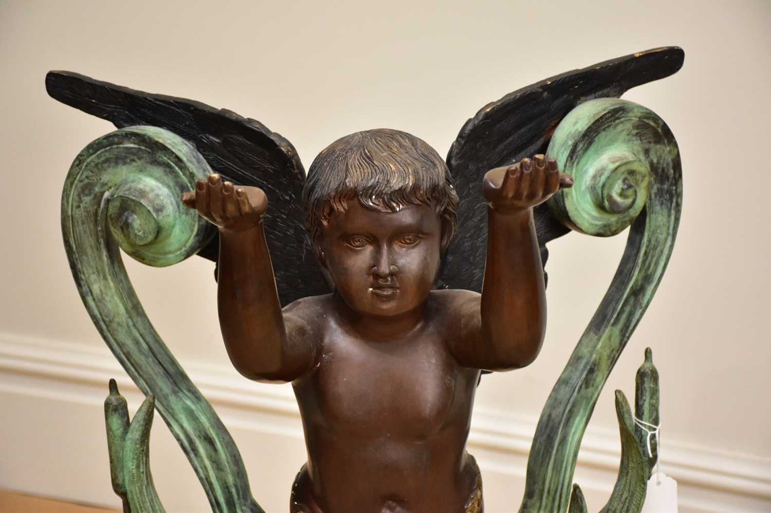 A modern decorative patinated metal figure of a standing cherub on marble base, height 90cm. - Image 2 of 4