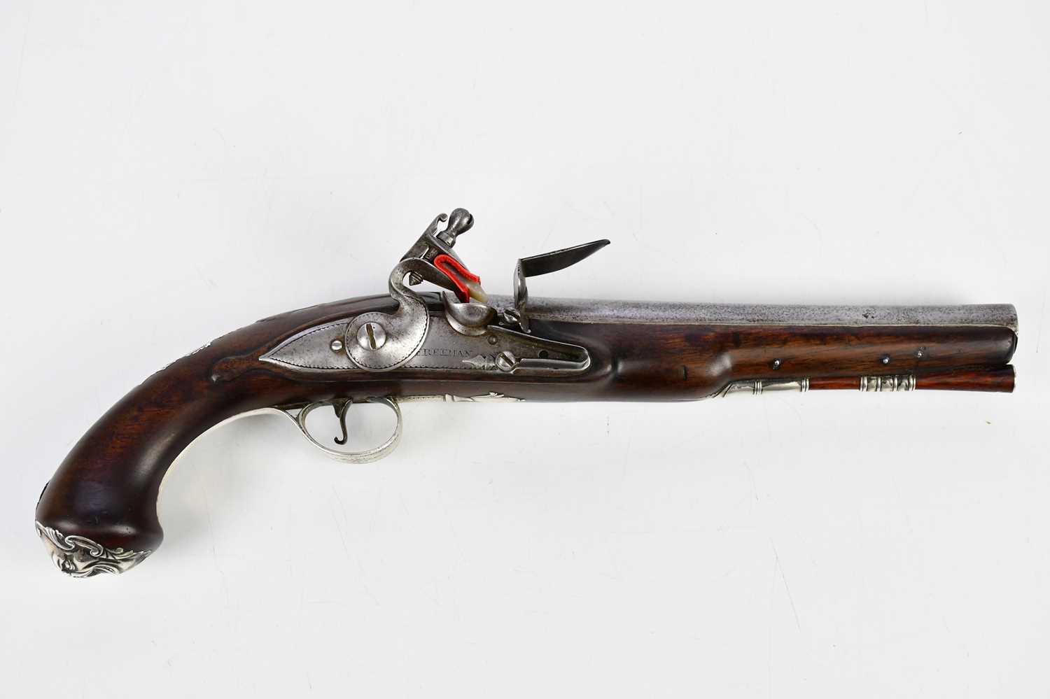 FREEMAN OF LONDON; an 18th century 22 bore travelling pistol, the barrel marked with two early