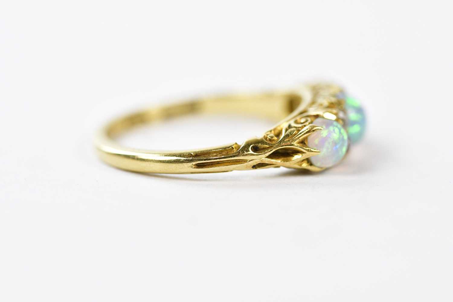 A Victorian yellow metal opal and diamond set dress ring, size J, approx weight 3g. - Image 2 of 3
