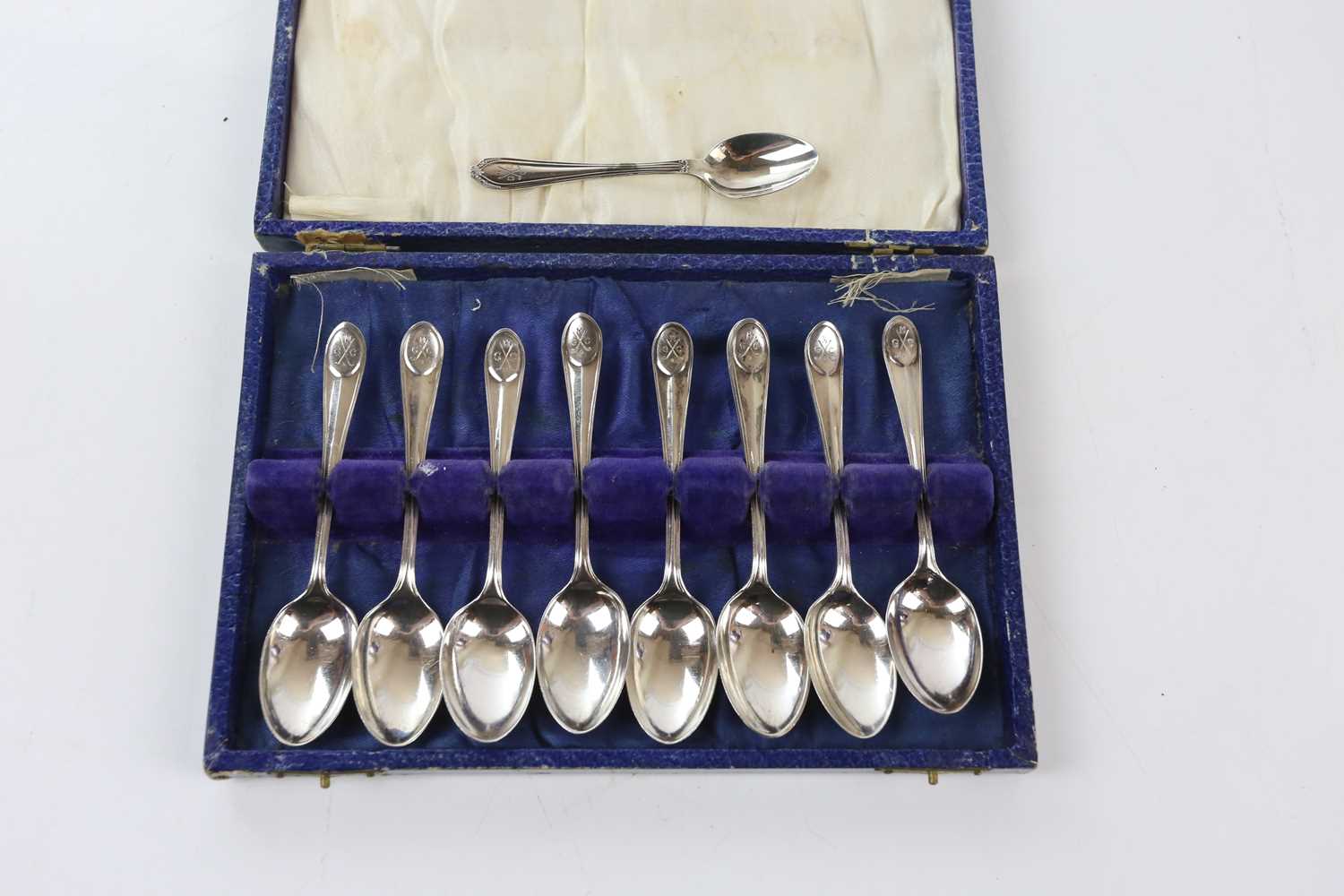 CHARLES BOYNTON & SON; nine hallmarked silver gold tea spoons, with engraved initials and cross