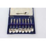 CHARLES BOYNTON & SON; nine hallmarked silver gold tea spoons, with engraved initials and cross