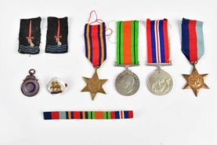 A WWII four piece medal group comprising the Burma Star, the 1939-45 Star, the Defence Medal and the