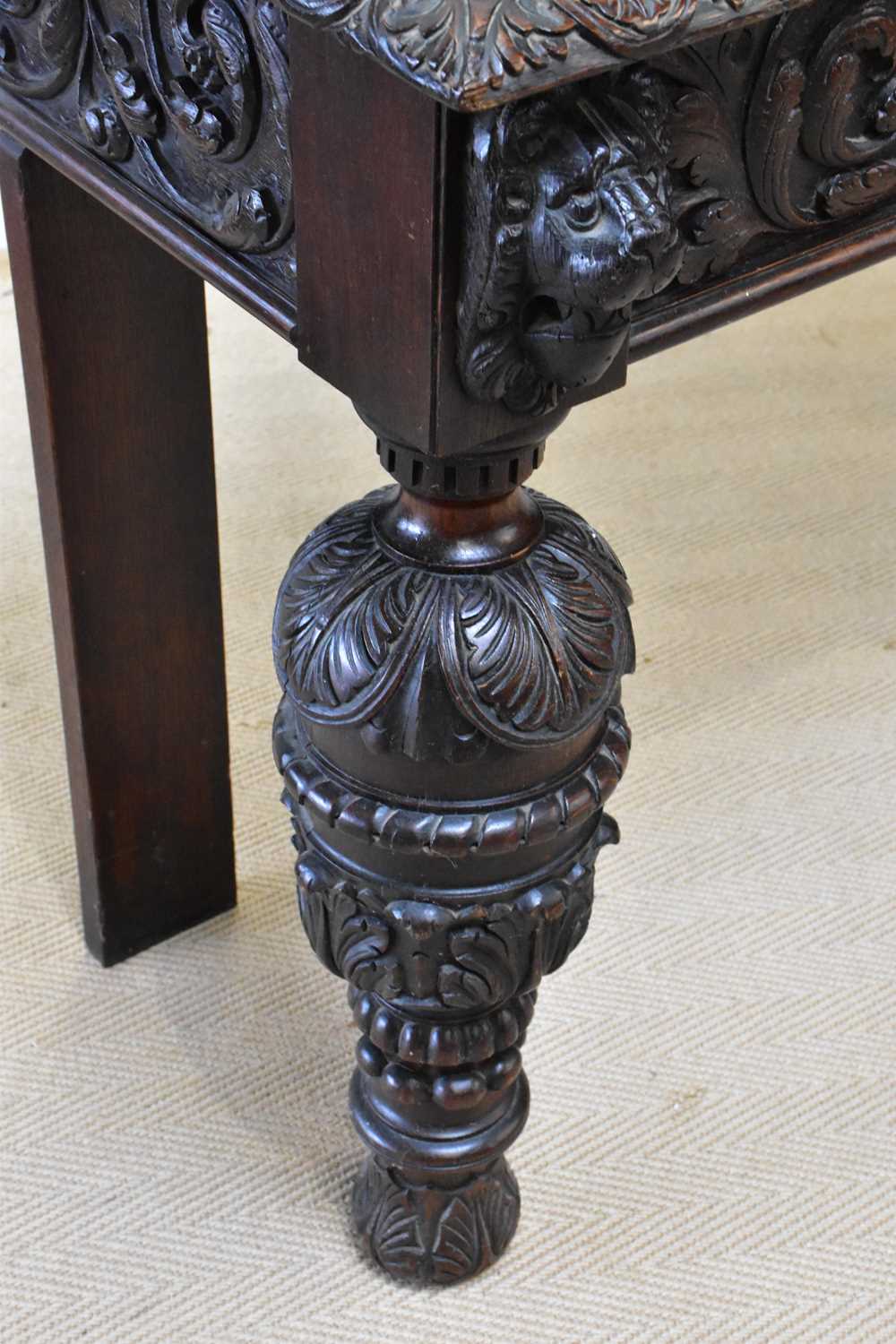 A 19th century Flemish style carved oak side table, height 88cm, width 121cm, depth 47cm. - Image 3 of 4