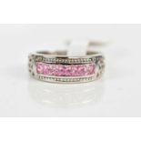 A silver and pink sapphire set half eternity ring, size L, weight 3.7g.