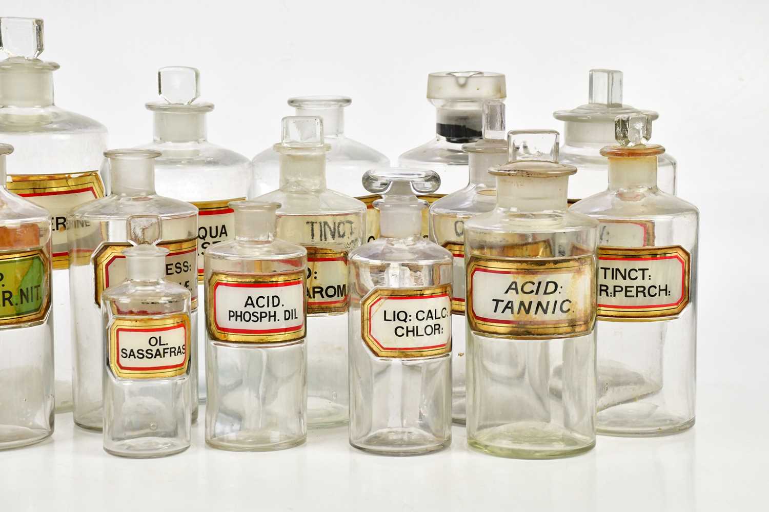 A collection of Victorian and later clear glass pharmaceutical bottles with glass labels, height - Image 3 of 3