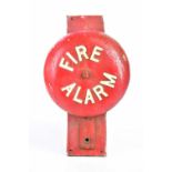 A vintage cast iron fire alarm bell, on wooden backplate, diameter of bell 30cm (no internal