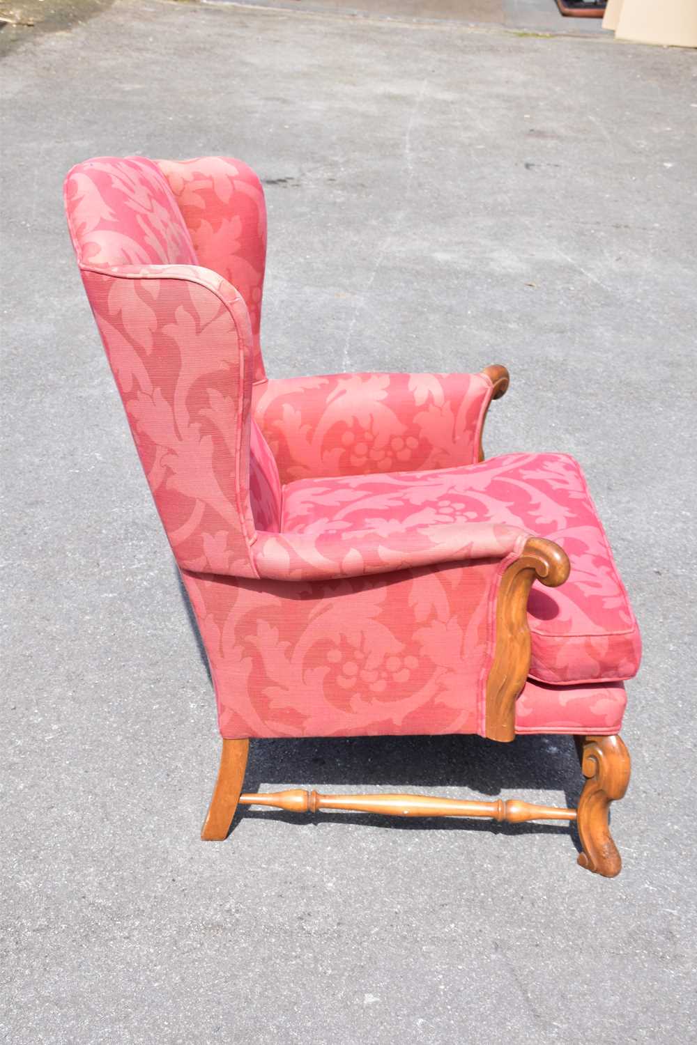 A pair of reproduction upholstered wingback armchairs. - Image 2 of 3