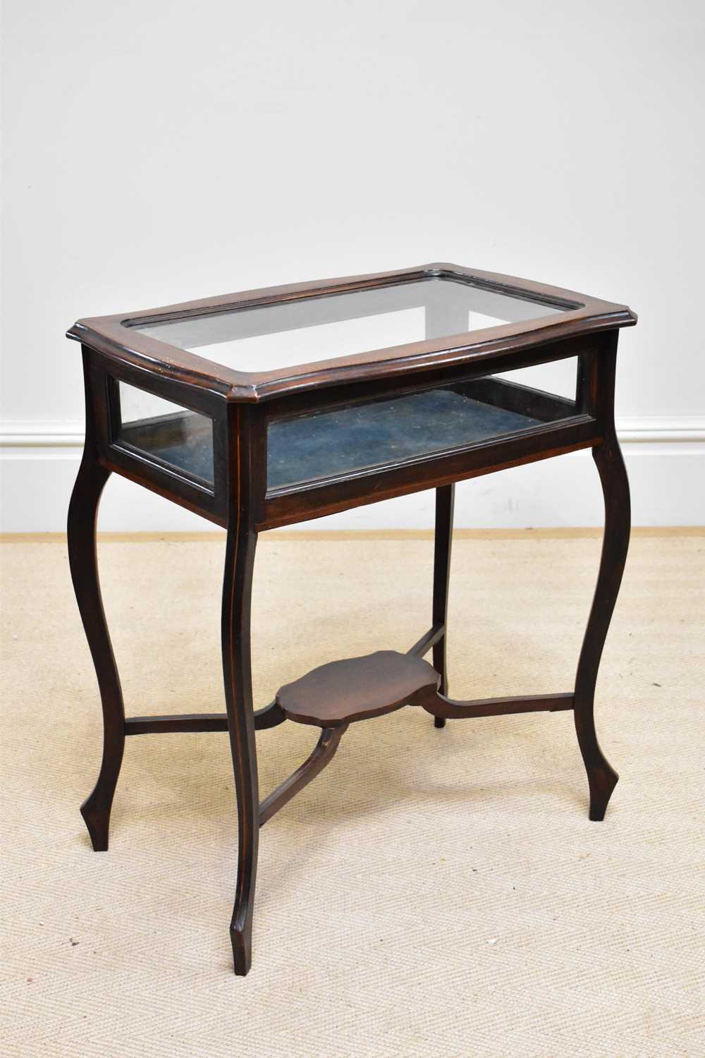 An Edwardian inlaid mahogany bijouterie table/cabinet on cabriole supports, width 61cm, depth