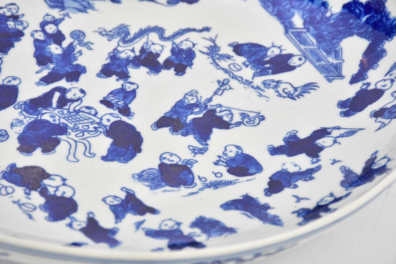 A modern Chinese blue and white bowl, painted with a hundred boys, bears double ring and six - Image 4 of 6