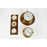 A late 19th century brass cased barometer, signed 'John Barker & Co, Kensington', mounted on oak