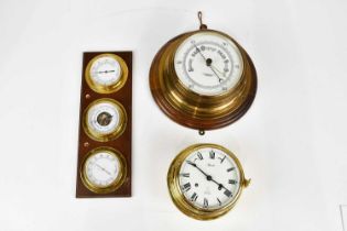 A late 19th century brass cased barometer, signed 'John Barker & Co, Kensington', mounted on oak