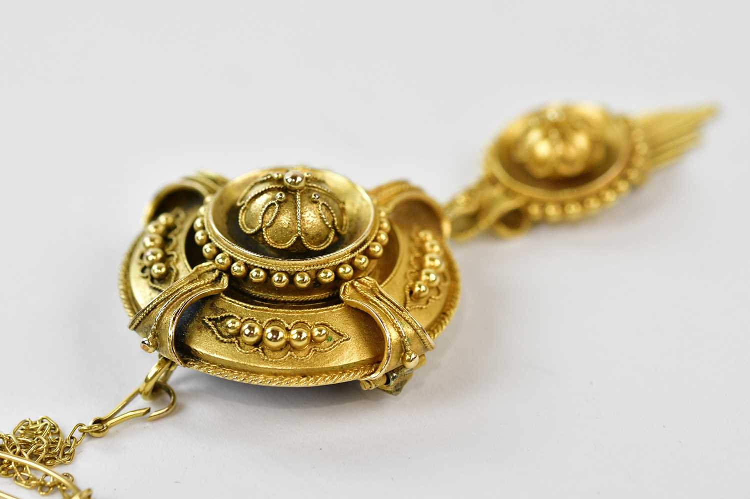 A Victorian yellow metal target brooch/pendant with cast decoration, height 5cm, approx 11.8g, - Image 3 of 3