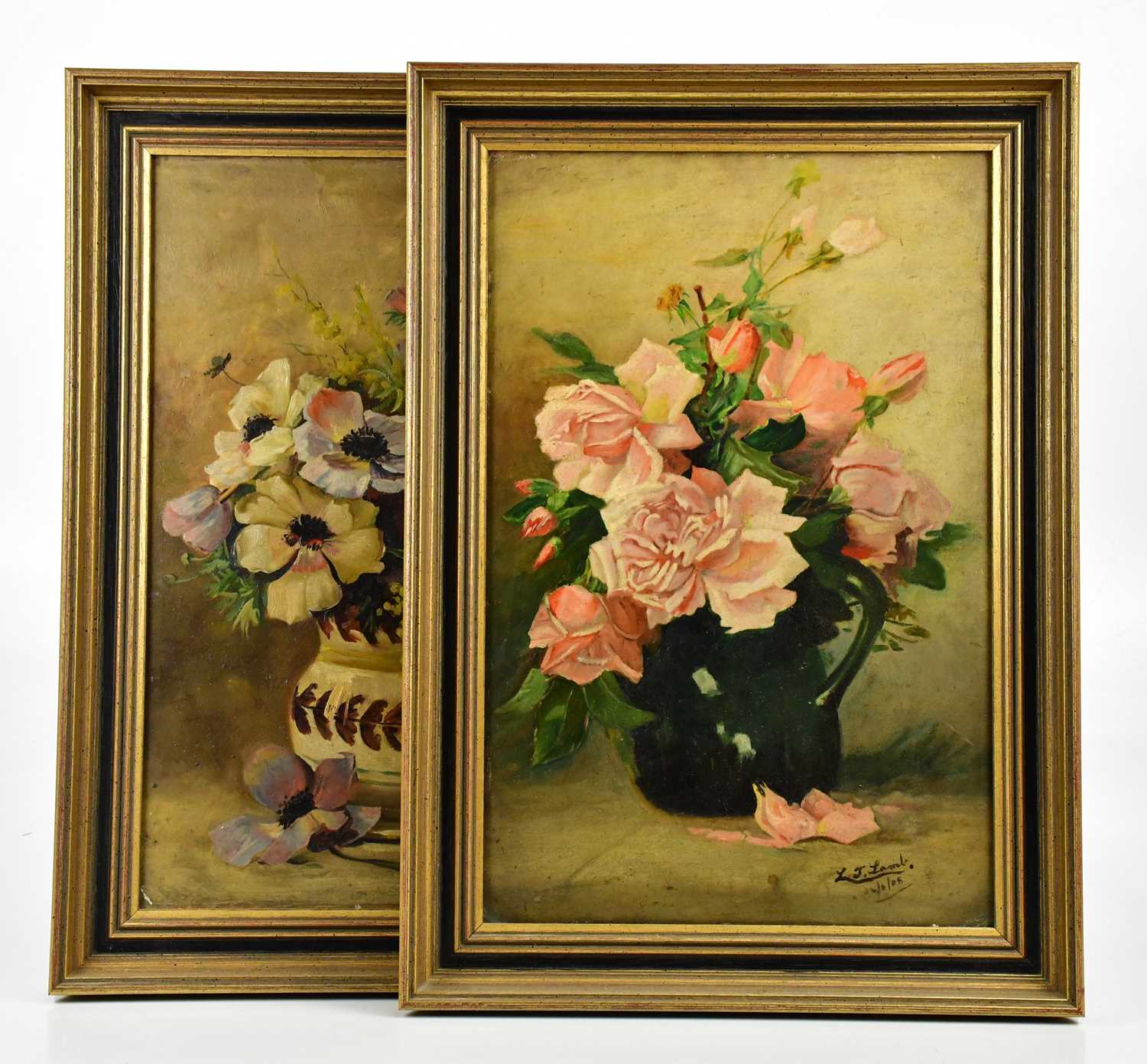 L J LAMB; pair of oils on board, still life of roses, signed and dated, 46 x 30cm, framed. (2)