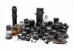 An extensive collection of manual, auto focus and large format lenses, to include an Olympus OM