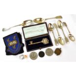 A small group of collectors' items to include a silver plated key, two hallmarked silver spoons,