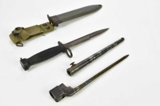 An American M7 bayonet with green scabbard and grip, and a socket bayonet and scabbard (2).
