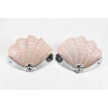 A pair of Art Deco style chrome and moulded pink tinted glass wall lights modelled as shells,