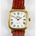 OMEGA; an 18ct yellow gold lady's DeVille wristwatch with leather bracelet and Omega buckle, no