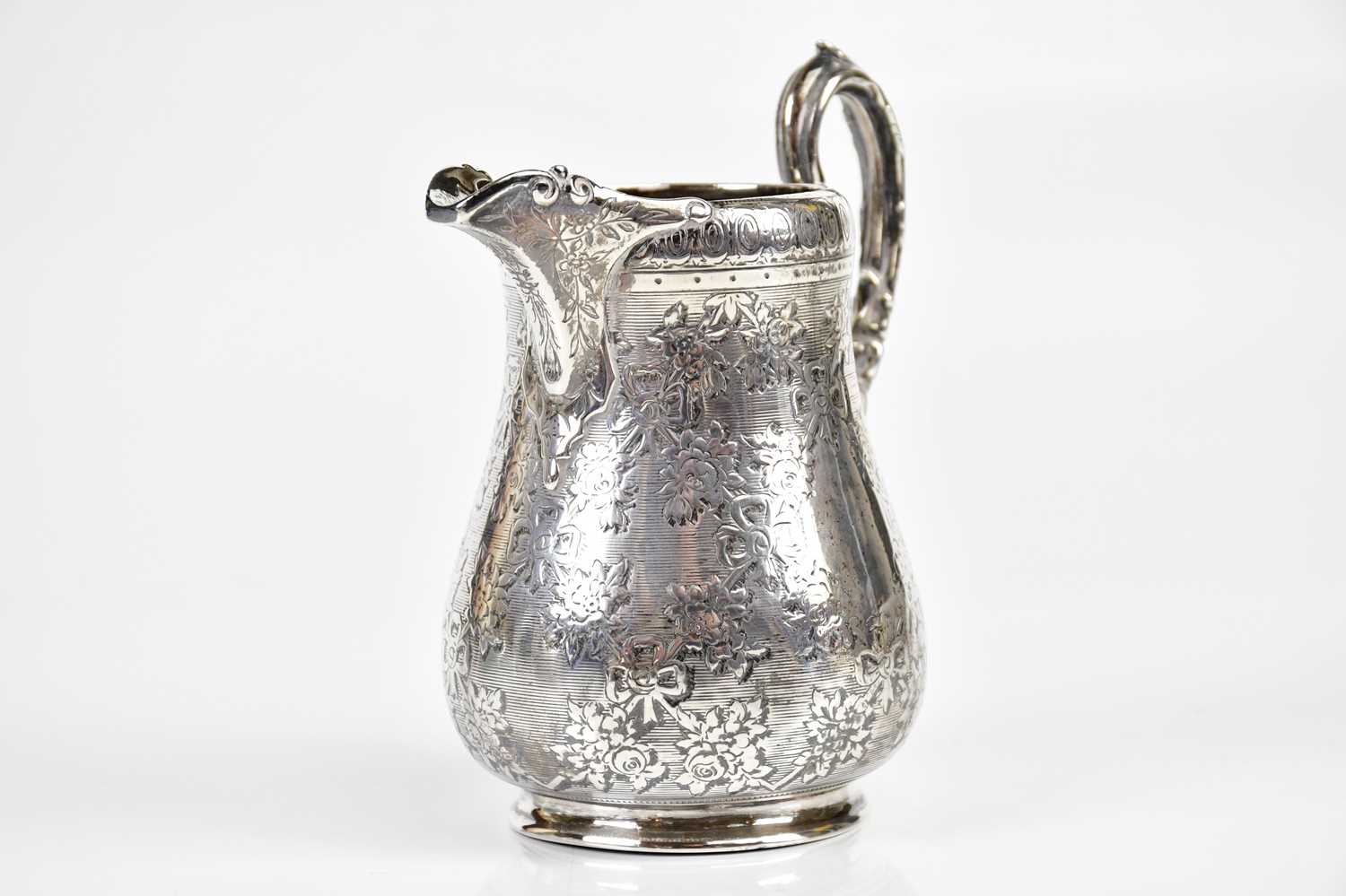 EDWARD, EDWARD JR, JOHN & WILLIAM BARNARD; a Victorian hallmarked silver cream jug with chased - Image 2 of 4