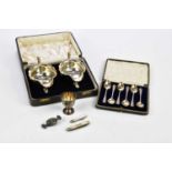 VINERS LTD; a pair of hallmarked silver George V cased sauceboats, Sheffield 1934, together with a