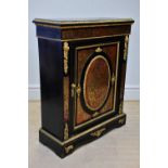 A 19th century ebonised brass bound Boulle work pier cabinet, with single panelled door on plinth