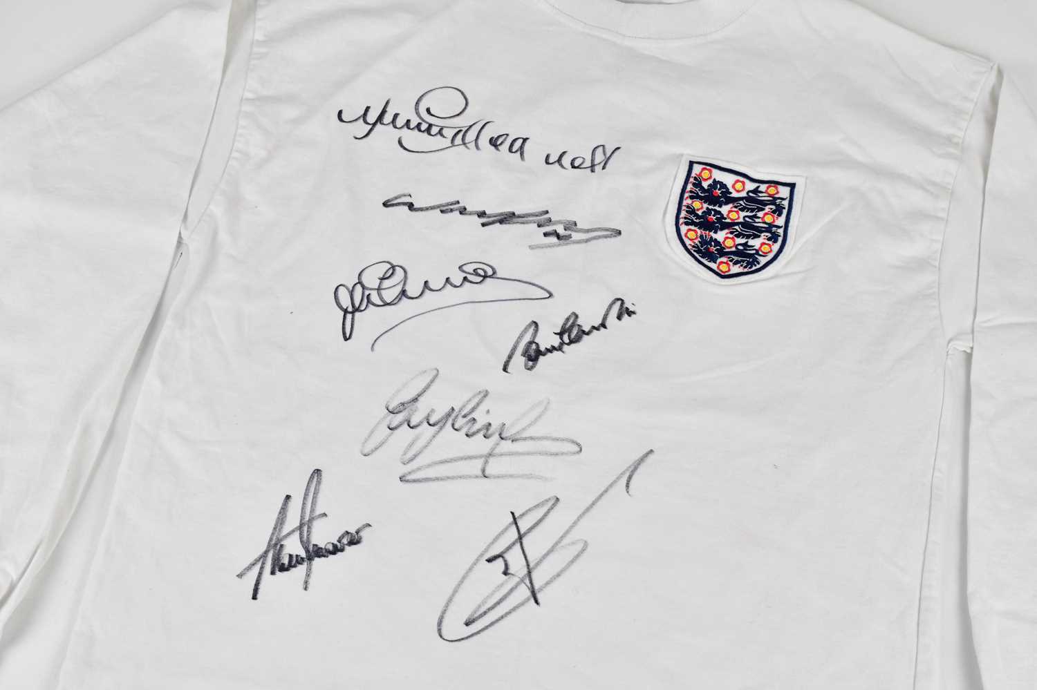 ENGLAND; a Top Scorers retro style football shirt, signed to the front Greaves, Kane, Owen, - Image 2 of 3