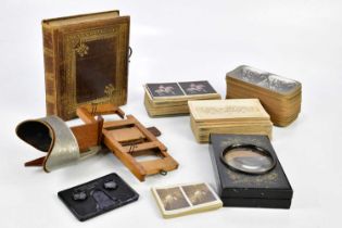 MILITARY INTEREST: a Sun Sculpture Victorian ebonised Stereoscopic viewer and a large quantity of