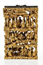 A Chinese giltwood hanging panel with carved battle scene and figures, 46 x 30cm. Condition