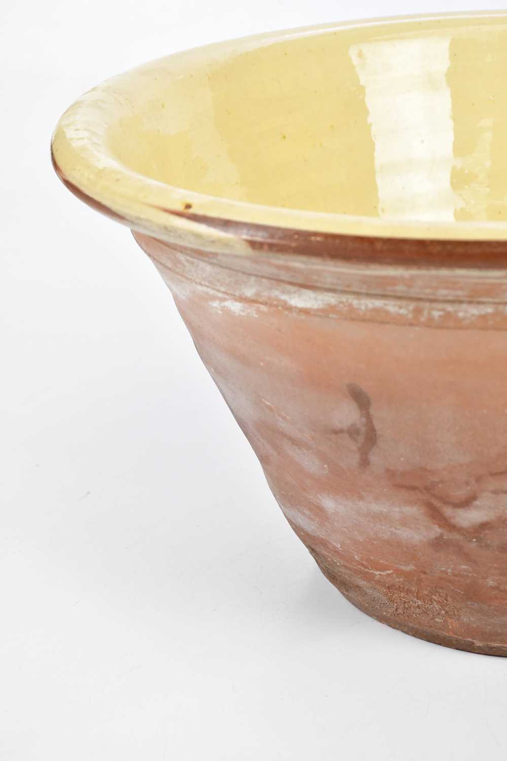 A large slipware terracotta dairy bowl, height 22cm. - Image 4 of 6