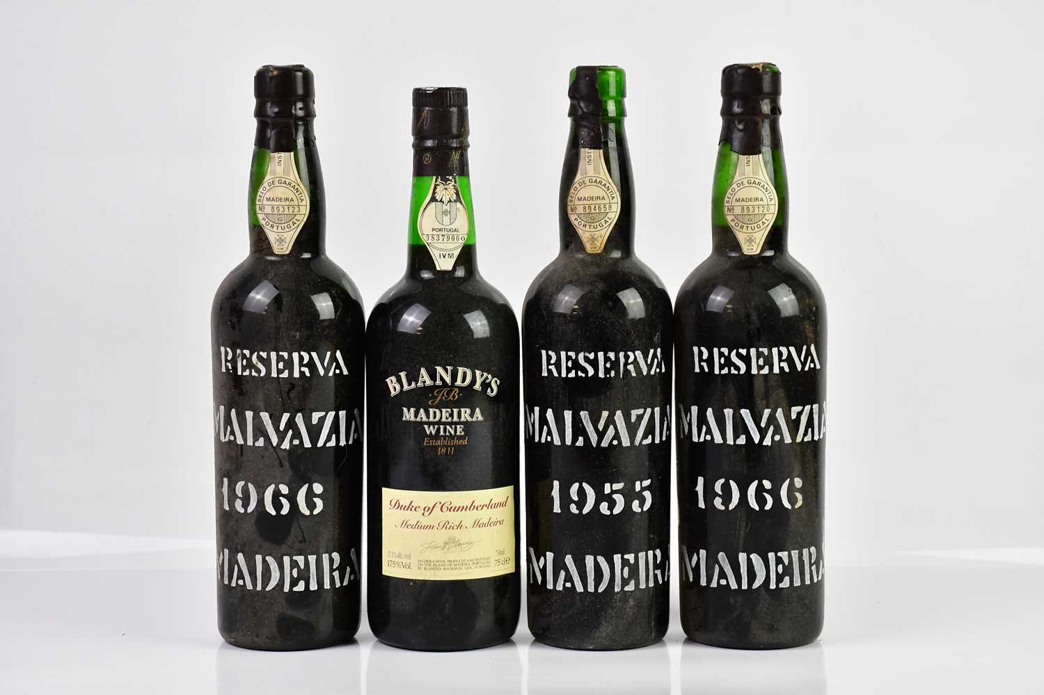 MADEIRA; four bottles comprising two bottles Reserva Malvazia 1966, a bottle Reserva Malvazia 1955