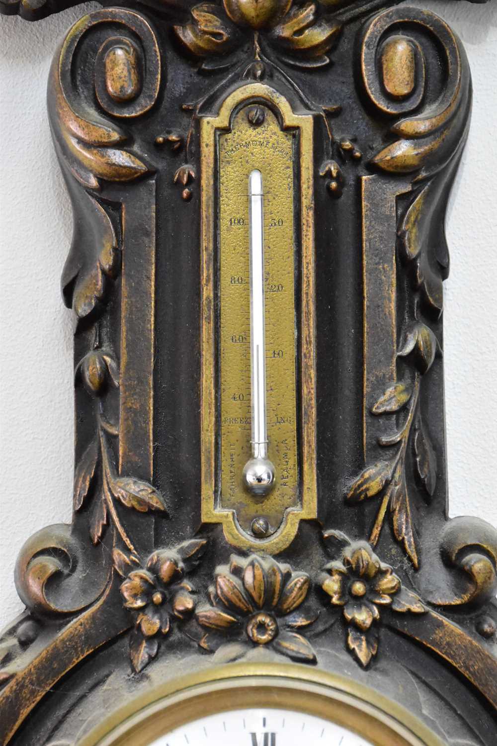 An early 20th century bronzed metal combination clock barometer/thermometer, the barometer signed 'J - Image 2 of 4