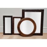 A Macclesfield carved oak framed wall mirror with bevelled plate, approx 83 x 67cm, two similar