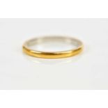 A 22ct yellow gold wedding band, size K, approx 2.7g.