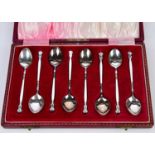 HENRY CLIFFORD DAVIS; a cased set of eight Elizabeth II hallmarked silver and enamelled teaspoons,