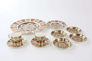 ROYAL CROWN DERBY; a collection of Imari ceramics to include six saucers, two cups, a plate and a