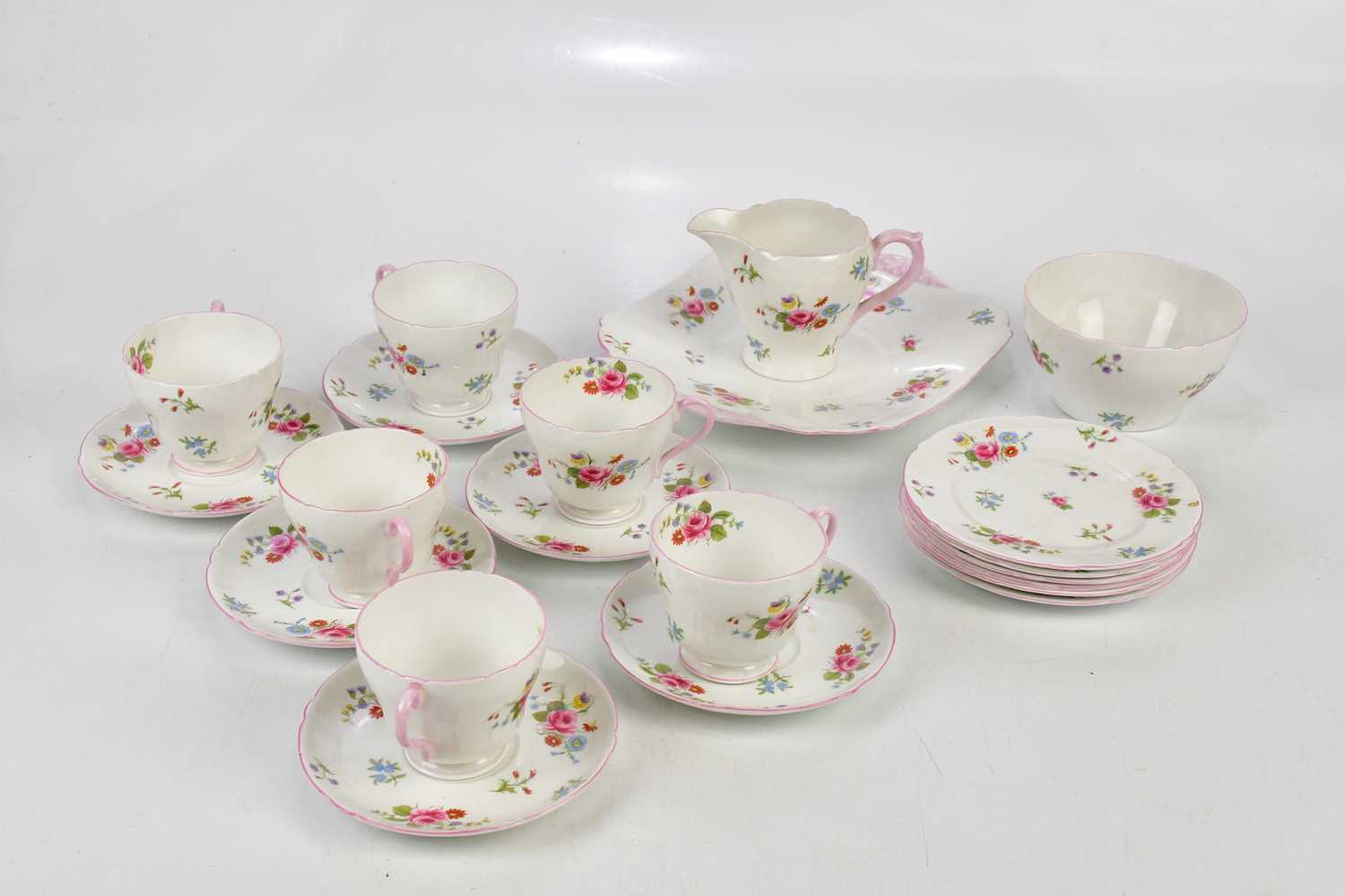 SHELLEY; a six setting tea service decorated with roses. Condition Report: Minor crazing throughout,