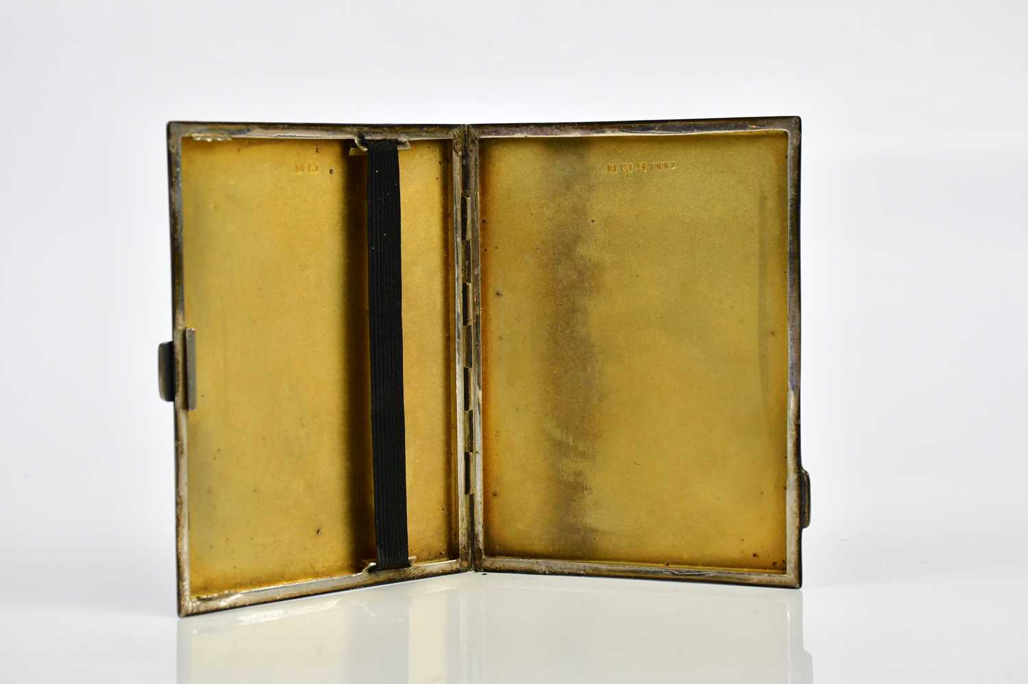 M H MAYER LTD; a George V hallmarked silver cigarette case of rectangular form with engine turned - Image 3 of 4