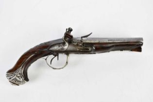 An 18th century English 32 bore silver mounted full stock double barrel flintlock pistol, the