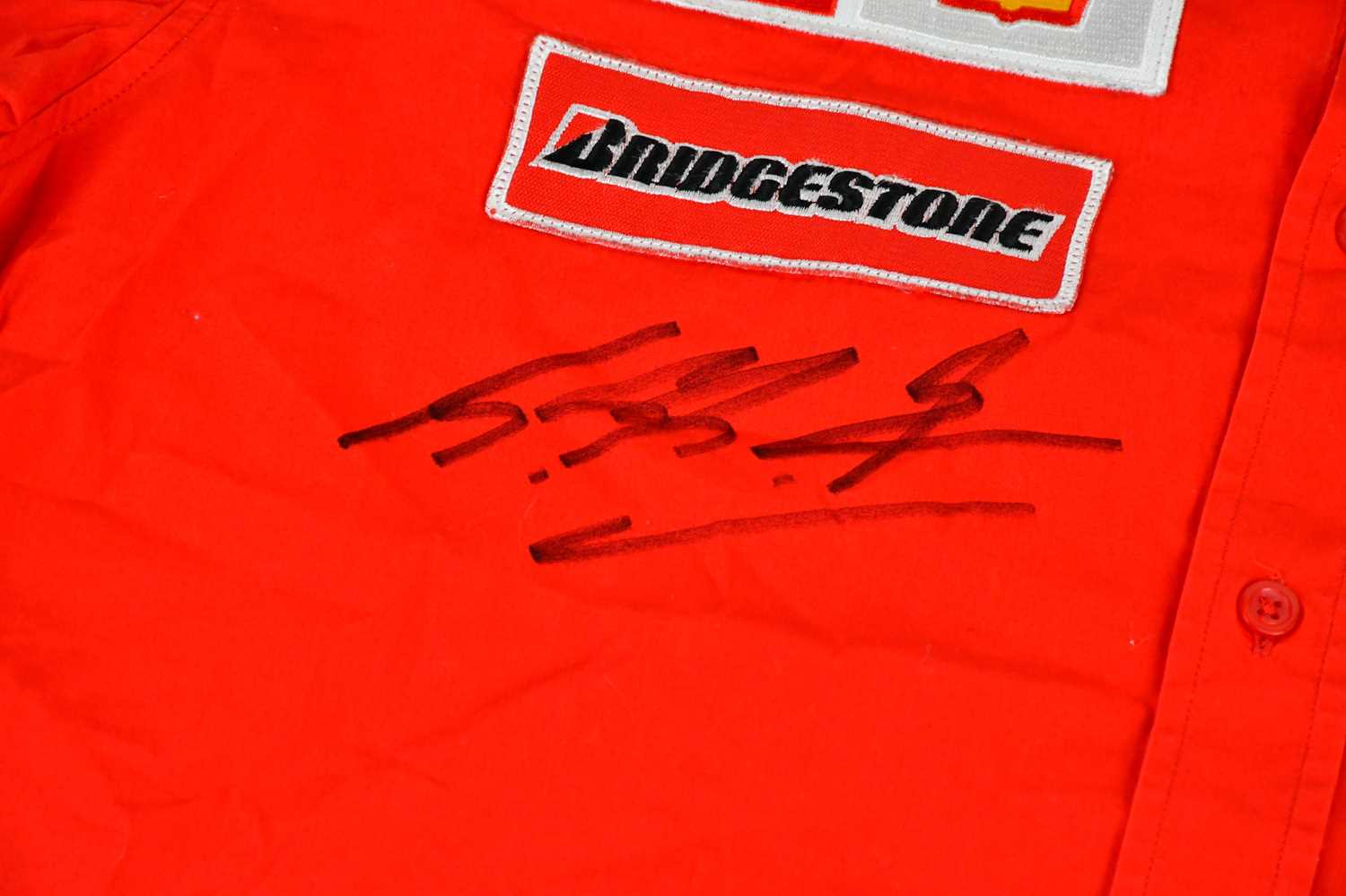 MICHAEL SCHUMACHER; a signed FILA Ferrari shirt, signed to the front, size XL. Condition Report: - Image 2 of 3