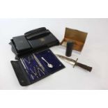 A white metal mounted ebony dressing table set, tray 34cm, with a chrome cigarette box, etc.