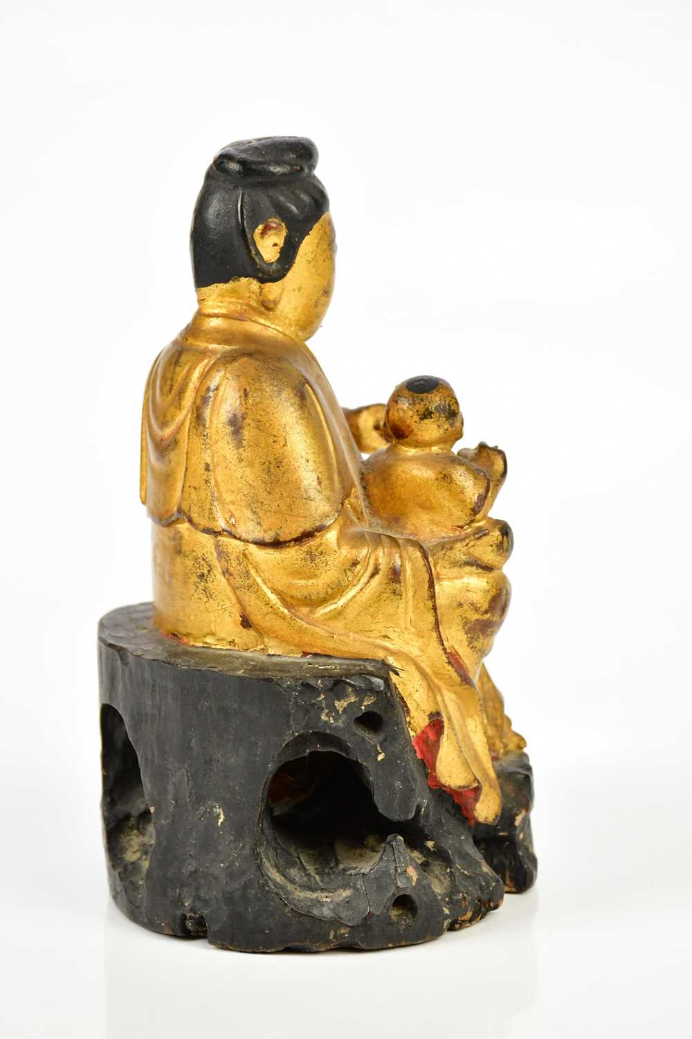 A 19th century Chinese gilt painted wooden model of Guanyin, with paper remains to the interior, - Bild 3 aus 5