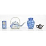 A small group of Japanese ceramics including a blue and white lidded ginger jar, a blue and white