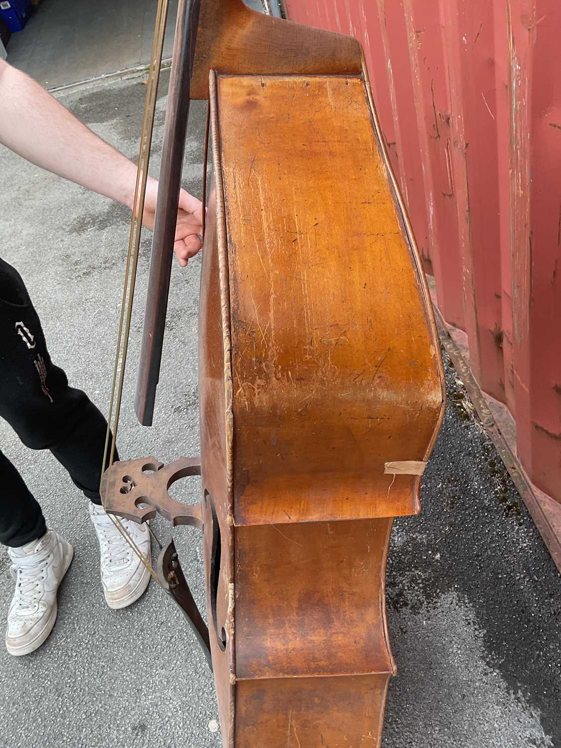 A double bass, possibly German, with two-piece back, 111cm to top of button, in need of restoration. - Image 11 of 25